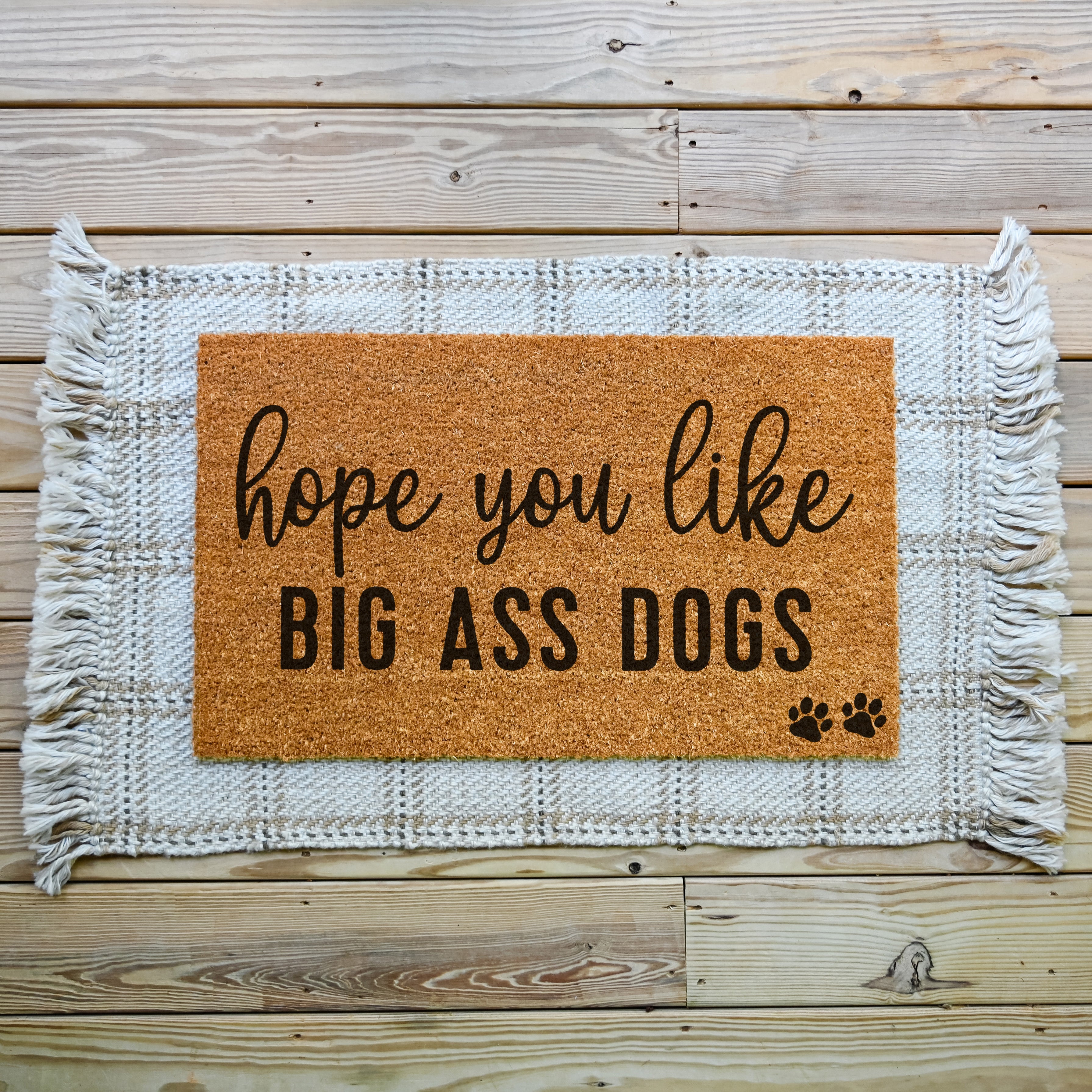 hope you like big ass dogs doormat.  coir doormat. paws in the corner.