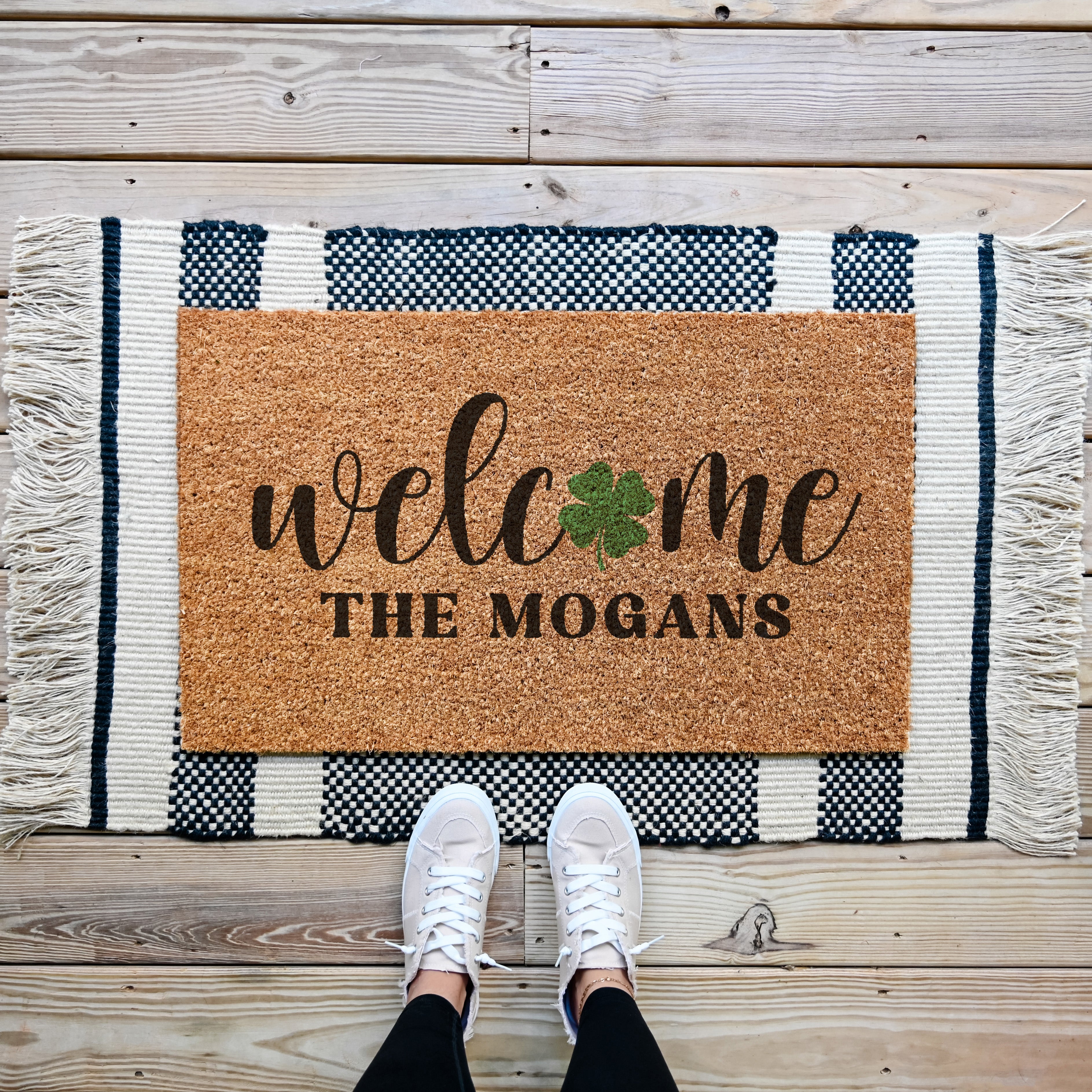 Personalized welcome doormat with a shamrock in place of the O in welcome.