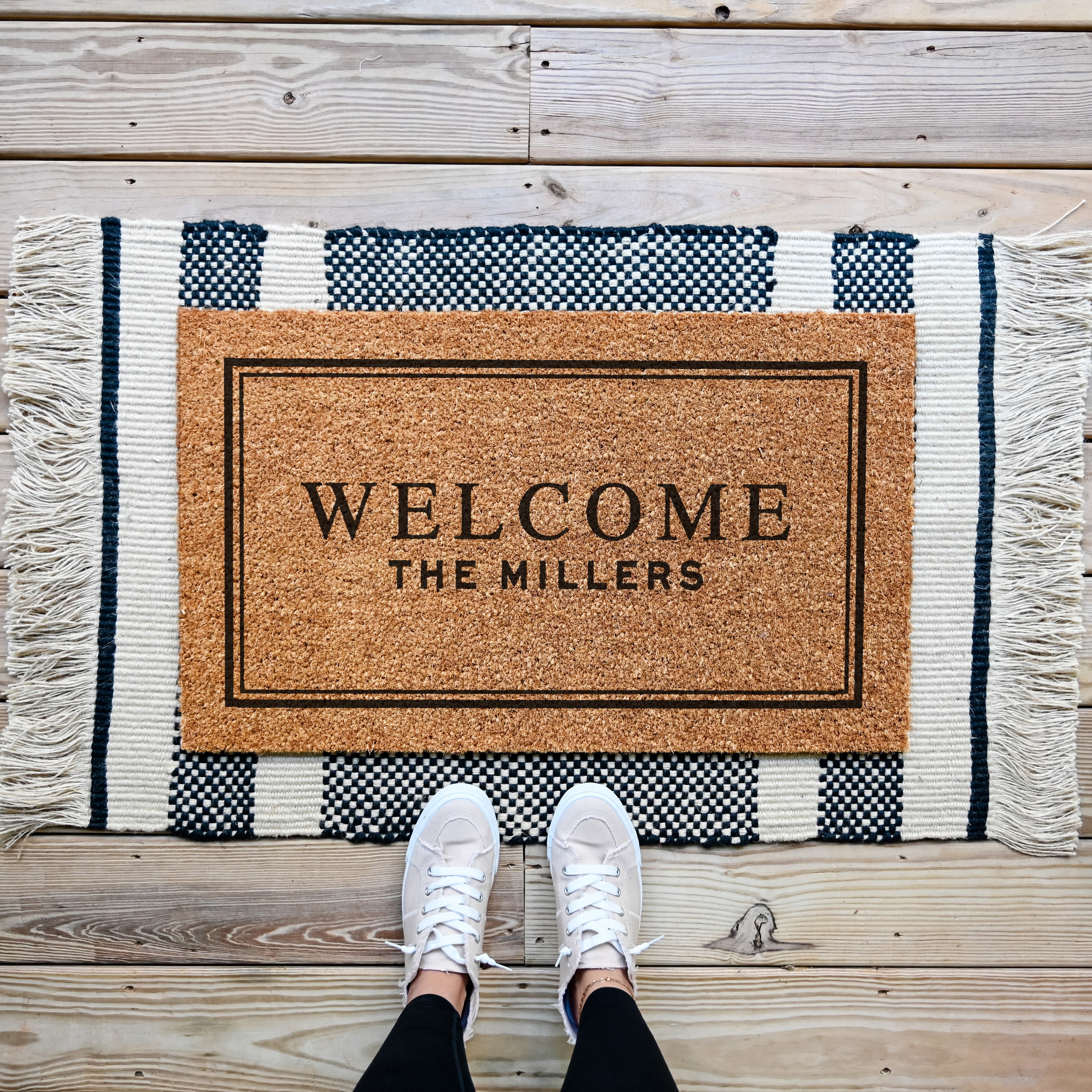 personalized doormat that says welcome and has space for family name underneath