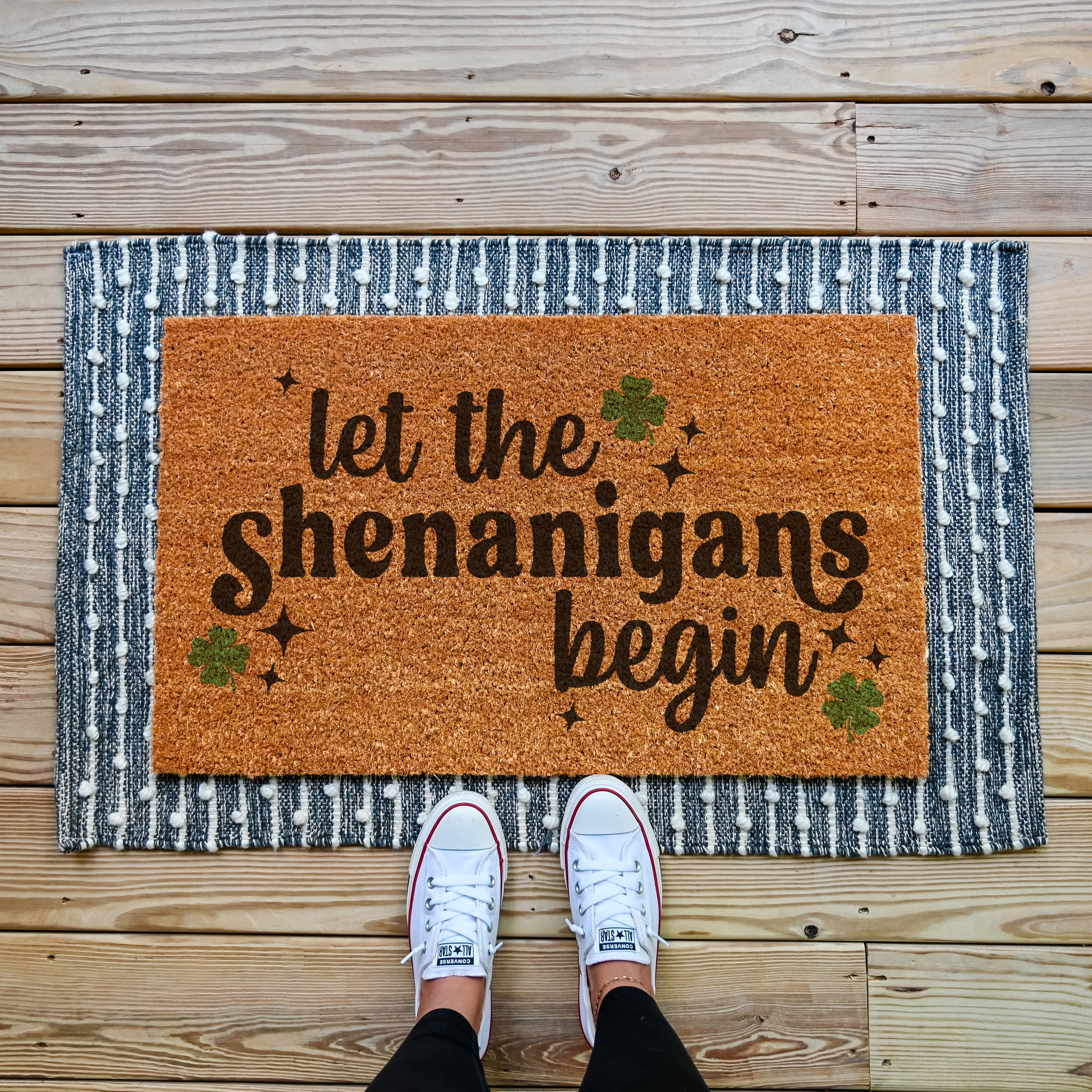 Funny St. Patricks Day doormat that says let the shenanigans begin.